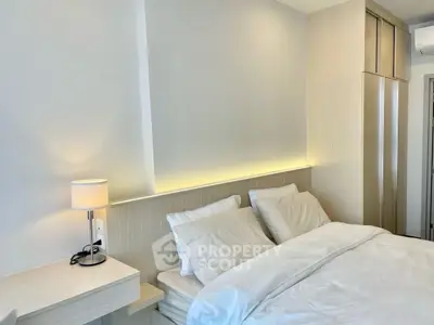 Modern bedroom with cozy lighting and sleek design