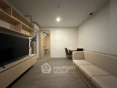 Modern living room with sleek furniture and open layout, perfect for contemporary living.