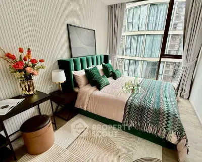 Luxurious bedroom with modern decor and large window view