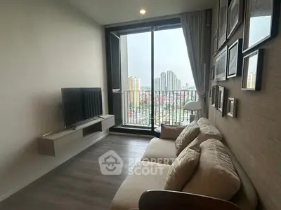 Modern living room with balcony view in high-rise apartment