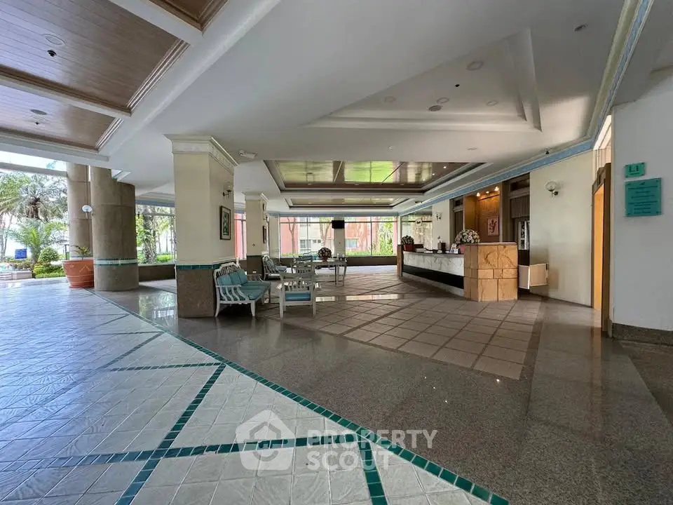 Spacious hotel lobby with modern design and elegant seating area