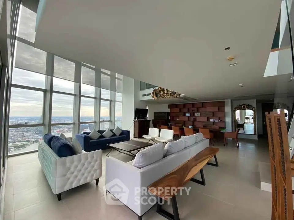 Luxurious modern living room with panoramic city views and elegant furnishings
