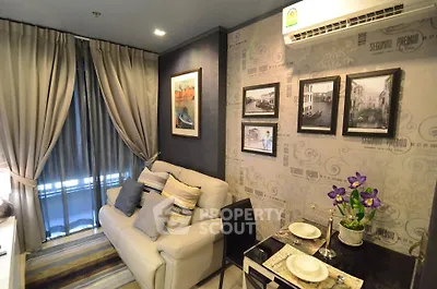 Cozy living room with elegant decor and dining area, featuring stylish curtains and wall art.