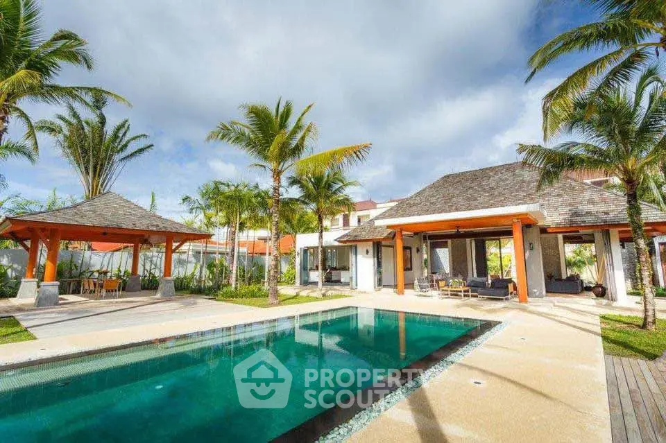 Luxurious tropical villa with private pool and lush garden, perfect for serene living and entertaining.