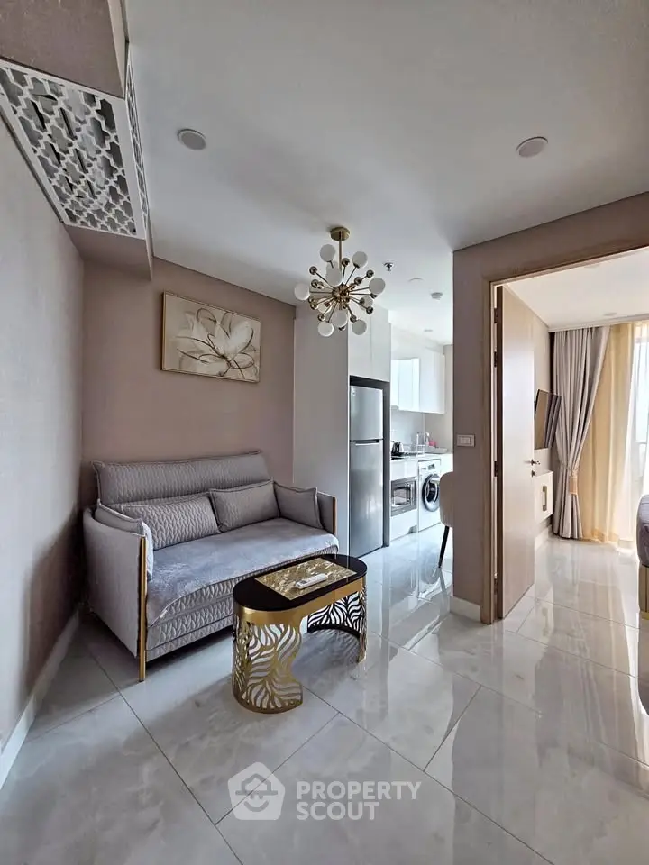 Modern living room with elegant decor and open kitchen layout