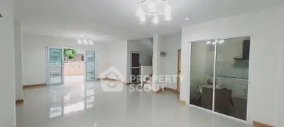 Spacious modern living room with open layout and elegant lighting