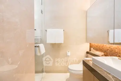 Luxurious modern bathroom with elegant fixtures and ambient lighting