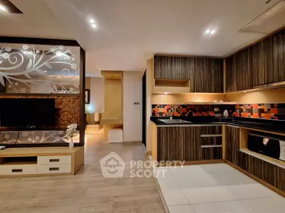 Modern open-layout kitchen with stylish backsplash and wood accents