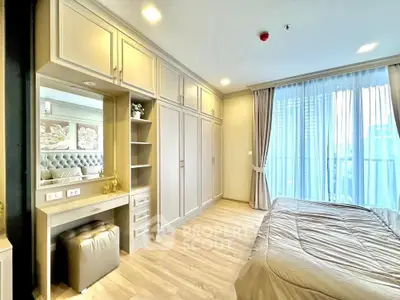 Luxurious bedroom with elegant built-in wardrobe and natural light