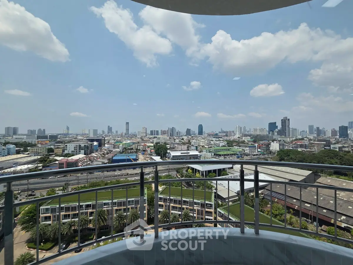 Stunning cityscape view from a high-rise balcony, perfect for urban living enthusiasts.