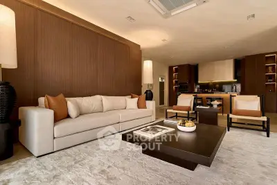 Luxurious modern living room with elegant furniture and open kitchen layout, perfect for stylish living.