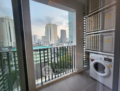 Modern apartment balcony with city view and washing machine