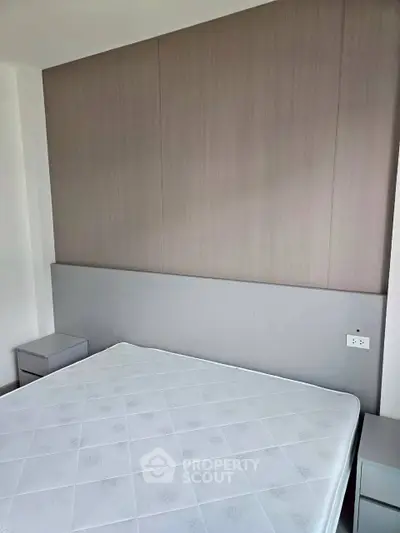 Minimalist bedroom with modern design and neutral tones