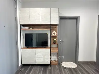 Modern living room with sleek TV cabinet and stylish decor