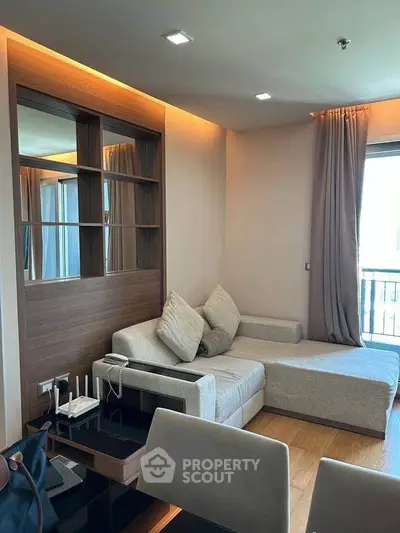 Modern living room with cozy sectional sofa and elegant decor