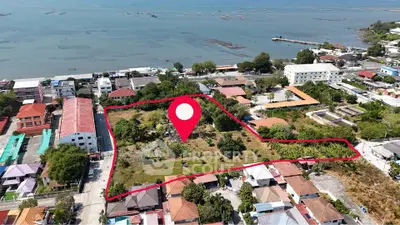 Prime coastal land plot with development potential and stunning sea views.