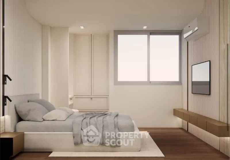 Modern minimalist bedroom with cozy bed and sleek decor