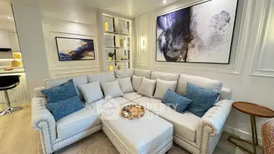 Luxurious living room with elegant sectional sofa and modern art decor