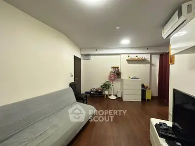 Cozy living room with modern furniture and air conditioning