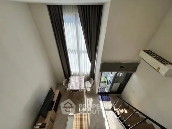 Modern loft apartment with high ceilings and natural light