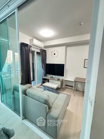 Modern living room with sliding glass doors and stylish decor