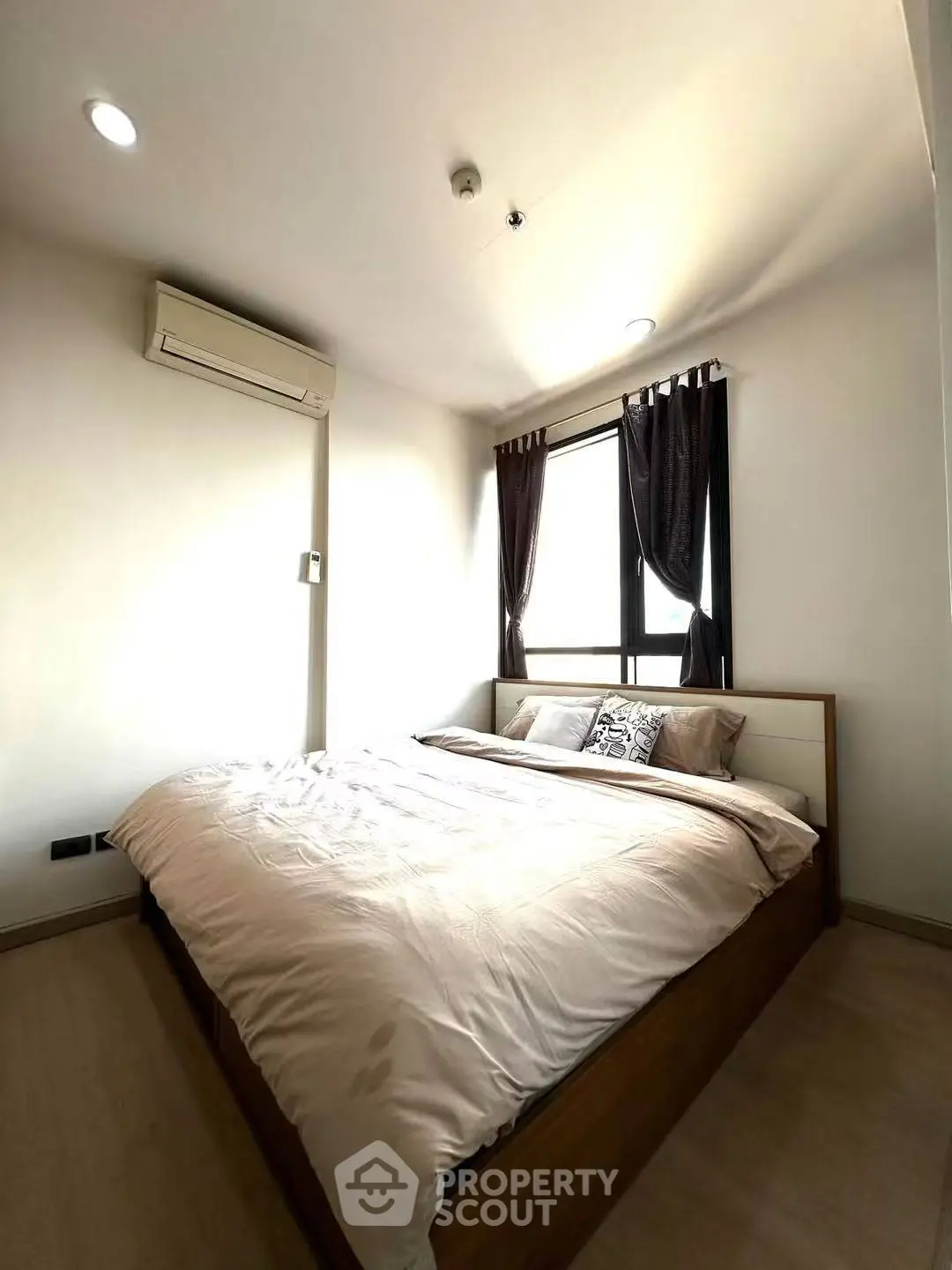 Cozy bedroom with natural light and modern decor