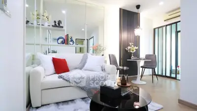 Modern living room with stylish decor and cozy seating area