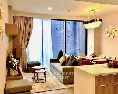 Luxurious modern living room with elegant decor and city view, perfect for urban living.