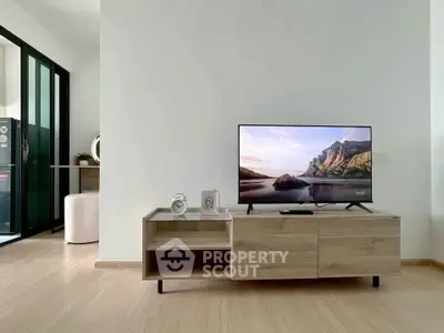 Modern living room with sleek TV stand and minimalist decor