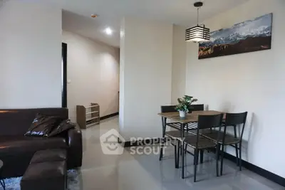 Modern living room with dining area and stylish decor