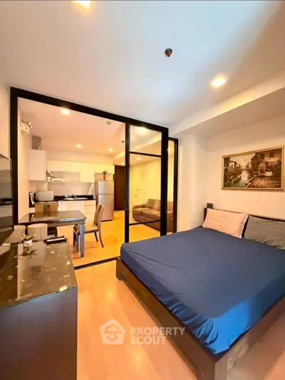 Modern studio apartment with open layout and stylish furnishings
