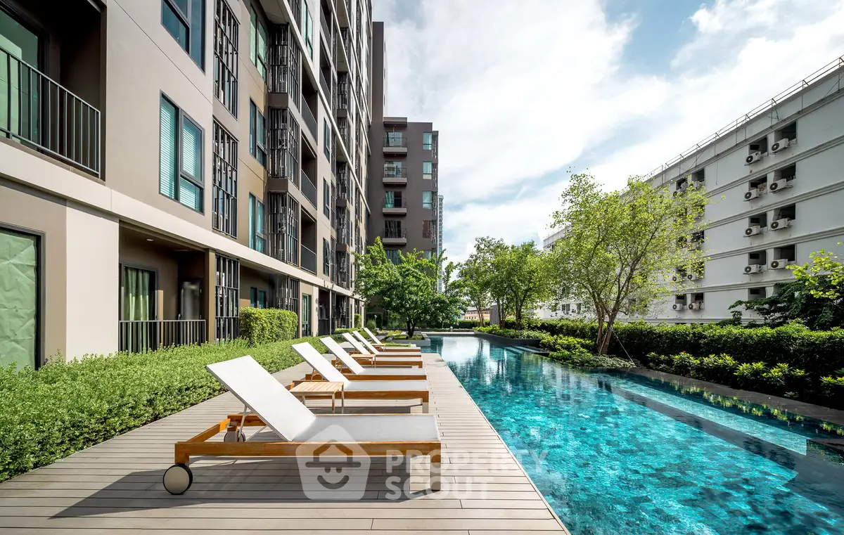 Luxurious apartment complex with stunning pool and modern design