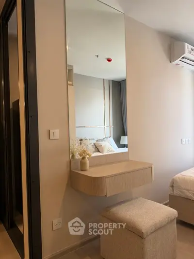 Modern bedroom with stylish vanity and cozy decor