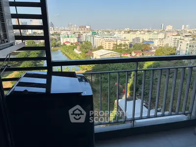 Stunning urban balcony view with cityscape and river, perfect for relaxation.