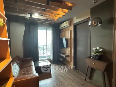 Stylish living room with modern decor and balcony view