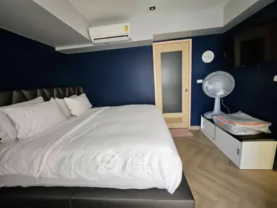 Modern bedroom with stylish decor and air conditioning