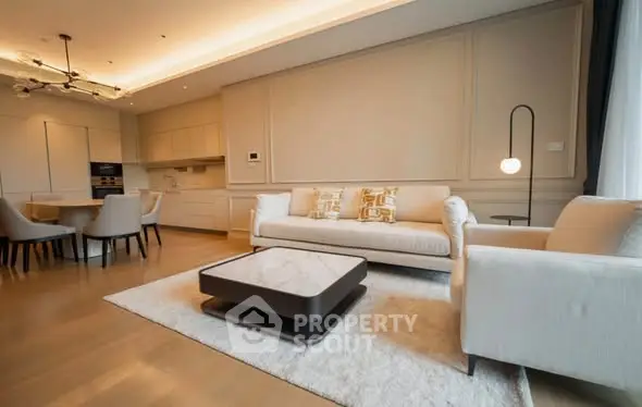 Luxurious open-layout living room with modern furniture and elegant decor
