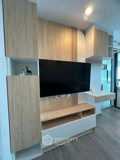 Modern living room with stylish wooden TV unit and sleek decor