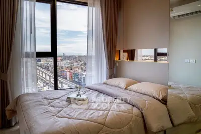 Luxurious bedroom with stunning city view and elegant decor