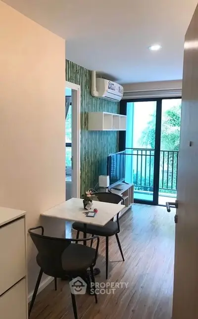 Modern living room with balcony view and stylish decor