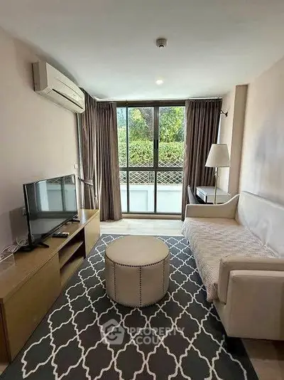 Cozy living room with modern decor and large window view