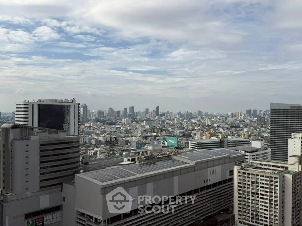 Stunning cityscape view from high-rise building showcasing urban skyline.