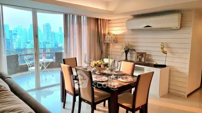 Luxurious dining area with city view and elegant decor in modern apartment