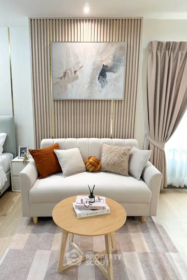 Elegant living room with modern decor and cozy seating area