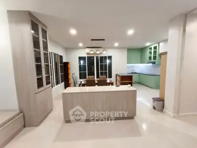 Spacious modern kitchen with open layout and sleek cabinetry