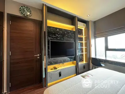 Modern bedroom with built-in TV and stylish decor