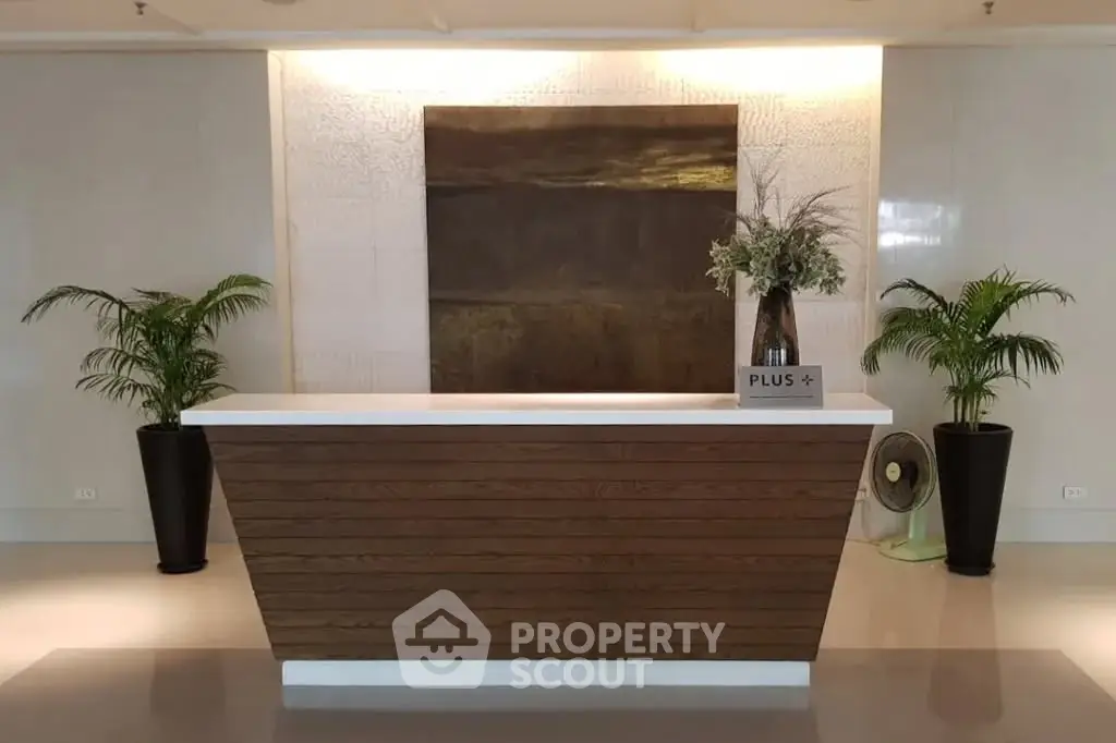 Elegant building lobby with modern reception desk and stylish decor