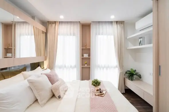 Modern bedroom with elegant decor and natural light