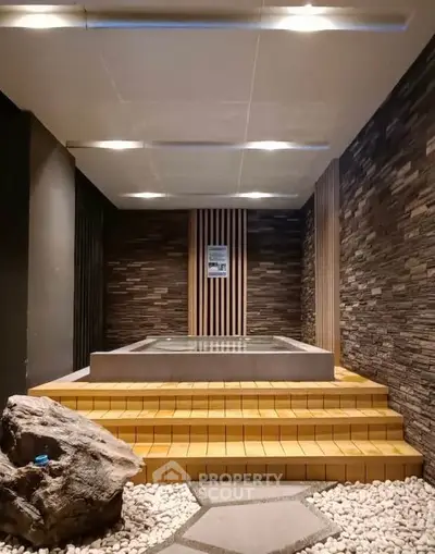 Luxurious indoor spa with stone walls and modern lighting