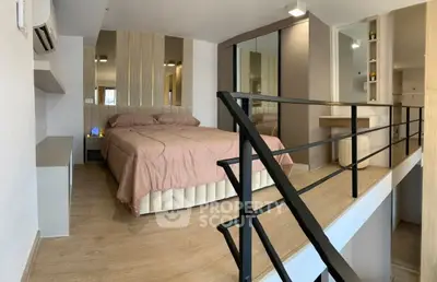 Modern loft bedroom with stylish decor and mezzanine level